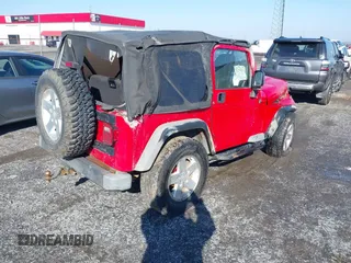 2005 Jeep Wrangler X with VIN 1J4FA39S95P385581, listed as a IAAI auction lot 41333338 with 150,010 mi miles and . Bid and sale history available at DreamBid. Image 4.