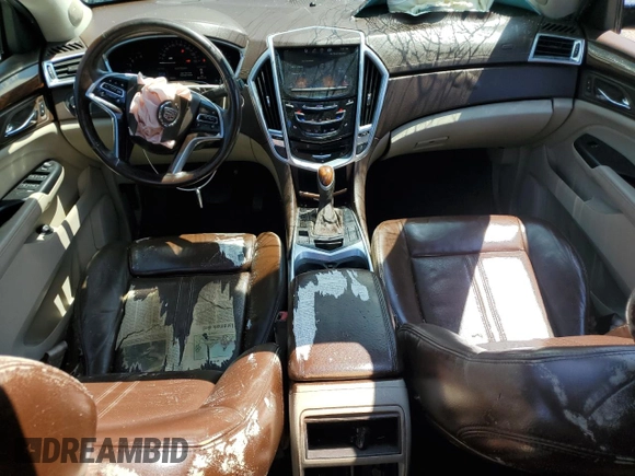 2015 Cadillac SRX Performance Collection z VIN 3GYFNCE31FS638057, wystawiony jako Copart lot #52454065 z przebiegiem 198 417 mil mil oraz Czysty tytuł • Clean title. Historia ofert i sprzedaży dostępna na DreamBid. Obrazek 8.