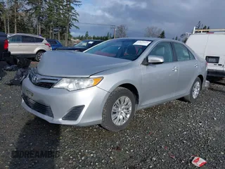 2014 Toyota Camry L with VIN 4T4BF1FK8ER419012, listed as a IAAI auction lot 41819331 with 84,372 mi miles and . Bid and sale history available at DreamBid. Image 2.
