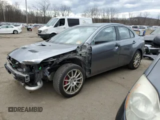 2015 Mitsubishi Lancer Evolution GSR with VIN JA32W8FV7FU020562, listed as a Copart auction lot 46608624 with 147,736 mi miles and Salvage Title. Bid and sale history available at carsss.com. Image 1.