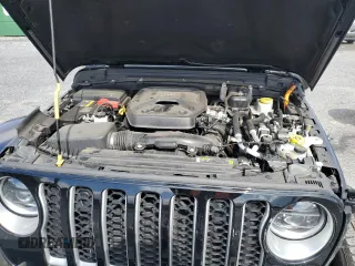 2023 Jeep Wrangler Sahara z VIN 1C4JJXP67PW513595, wystawiony jako Copart lot #53482175 z przebiegiem 30 943 mil mil oraz Szkoda całkowita • Salvage title. Historia ofert i sprzedaży dostępna na DreamBid. Obrazek 11.