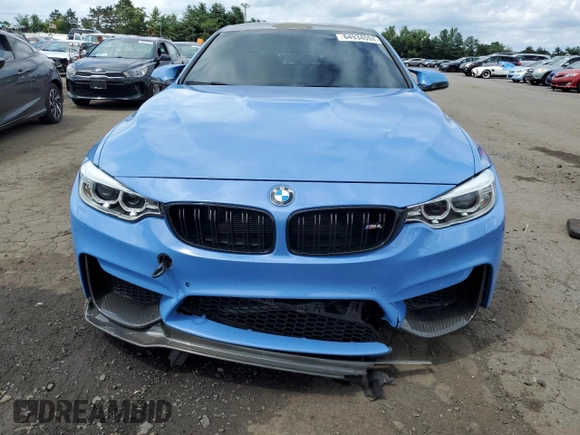 2015 BMW M4 with VIN WBS3R9C57FK332148, listed as a Copart auction lot 64934594 with 72,669 mi miles and Salvage Title. Bid and sale history available at carsss.com. Image 5.