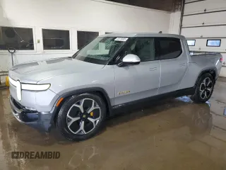 2022 Rivian R1T Launch Edition with VIN 7FCTGAAL8NN003336, listed as a Copart auction lot 45979395 with 23,117 mi miles and Salvage Title. Bid and sale history available at carsss.com. Image 1.