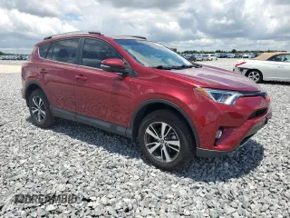 2018 Toyota RAV4 XLE with VIN 2T3WFREV7JW477541, listed as a Copart auction lot 64756575 with 59,779 mi miles and Salvage title. Bid and sale history available at DreamBid. Image 4.