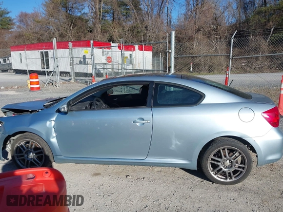 2006 Scion tC with VIN JTKDE177960090990, listed as a IAAI auction lot 41690362 with 197,613 mi miles. Bid and sale history available at carsss.com. Image 14.