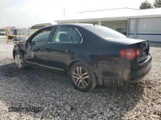 2009 Volkswagen Jetta S z VIN 3VWJM71K39M165677, wystawiony jako Copart lot #56901665 z przebiegiem 202 632 mil mil oraz Czysty tytuł • Clean title. Historia ofert i sprzedaży dostępna na DreamBid. Obrazek 2.