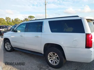 2018 Chevrolet Suburban LT with VIN 1GNSCHKC8JR358781, listed as a IAAI auction lot 40474820 with Not Provided miles and . Bid and sale history available at DreamBid. Image 14.