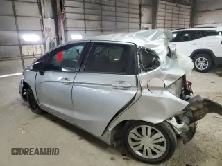 2015 Honda Fit LX with VIN 3HGGK5H53FM748495, listed as a Copart auction lot 86590994 with 124,000 mi miles and Salvage Title. Bid and sale history available at carsss.com. Image 2.