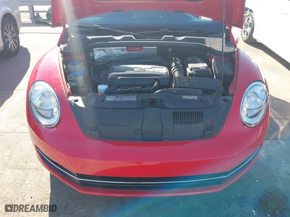 2012 Volkswagen Beetle 2.0T Turbo w/Sun/Sound with VIN 3VWV67ATXCM650376, listed as a IAAI auction lot 41315431 with 104,523 mi miles. Bid and sale history available at carsss.com. Image 10.