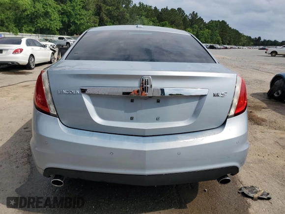 2009 Lincoln MKS with VIN 1LNHM93R59G620803, listed as a Copart auction lot 57283775 with 186,445 mi miles and Salvage title. Bid and sale history available at DreamBid. Image 6.