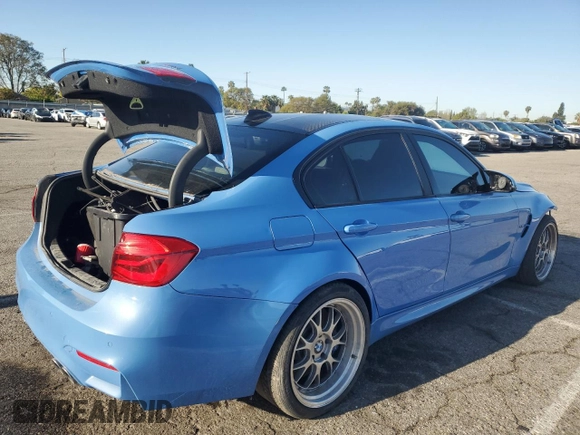 2015 BMW M3 z VIN WBS3C9C58FP806094, wystawiony jako Copart lot #52009855 z przebiegiem Nie podano mil oraz Szkody całkowita. Historia ofert i sprzedaży dostępna na DreamBid. Obrazek 3.