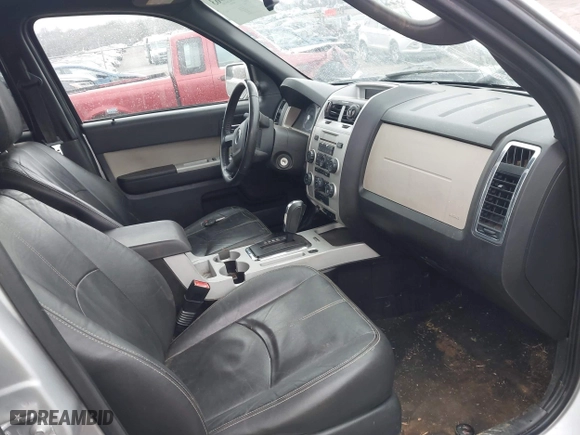 2010 Mercury Mariner Premier with VIN 4M2CN8HG4AKJ02111, listed as a IAAI auction lot 41423963 with 246,600 mi miles. Bid and sale history available at carsss.com. Image 5.