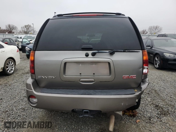 2006 GMC Envoy SLT with VIN 1GKDS13S962138197, listed as a Copart auction lot 85679094 with 166,376 mi miles and Salvage Title. Bid and sale history available at carsss.com. Image 6.