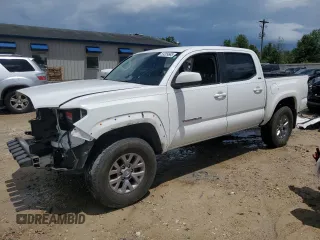 2017 Toyota Tacoma SR5 with VIN 5TFAZ5CN6HX041069, listed as a Copart auction lot 59309685 with 85,180 mi miles and Salvage title. Bid and sale history available at DreamBid. Image 1.