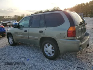 2003 GMC Envoy SLT with VIN 1GKDS13S832408371, listed as a Copart auction lot 44166715 with 208,256 mi miles and Salvage Title. Bid and sale history available at carsss.com. Image 2.