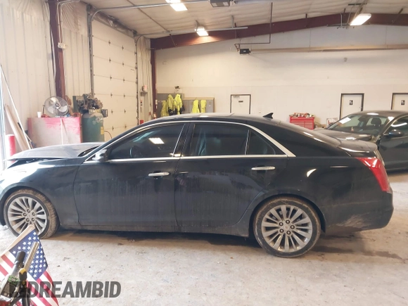 2014 Cadillac CTS Luxury AWD with VIN 1G6AX5SX2E0195357, listed as a IAAI auction lot 41677831 with 152,567 mi miles and . Bid and sale history available at DreamBid. Image 14.