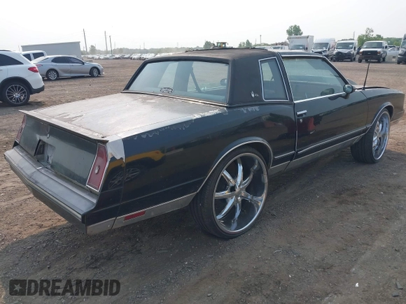 1984 Chevrolet Monte Carlo z VIN 1G1AZ37H9ER201513, wystawiony jako IAAI lot #42416804 z przebiegiem 80 467 mil mil oraz . Historia ofert i sprzedaży dostępna na DreamBid. Obrazek 4.