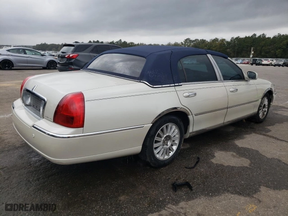 2005 Lincoln Town Car Signature with VIN 1LNHM81W15Y629313, listed as a Copart auction lot 47519065 with 180,971 mi miles and Salvage Title. Bid and sale history available at carsss.com. Image 3.