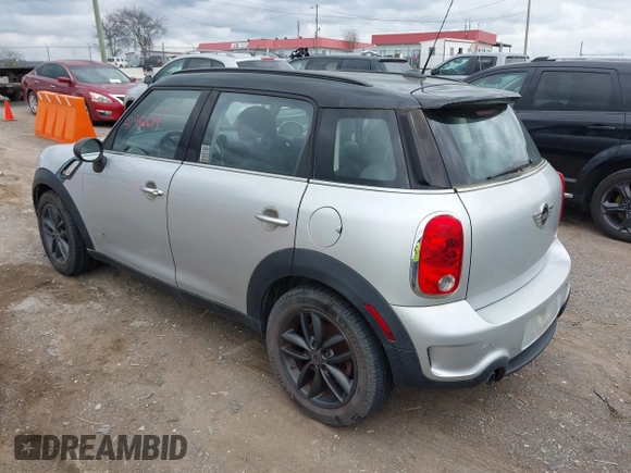 2011 MINI Countryman S with VIN WMWZC5C51BWM10385, listed as a IAAI auction lot 41952679 with 112,008 mi miles and . Bid and sale history available at DreamBid. Image 3.