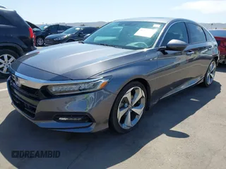 2019 Honda Accord Touring with VIN 1HGCV2F92KA004825, listed as a IAAI auction lot 41974555 with 74,464 mi miles and . Bid and sale history available at DreamBid. Image 2.