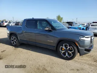 2022 Rivian R1T Adventure z VIN 7FCTGAAA9NN008771, wystawiony jako Copart lot #56243835 z przebiegiem 31 006 mil mil oraz Szkody całkowita. Historia ofert i sprzedaży dostępna na DreamBid. Obrazek 4.