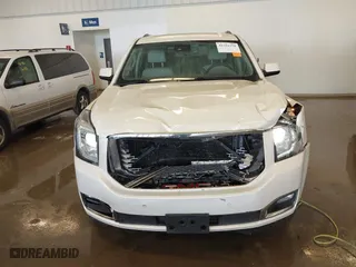 2015 GMC Yukon XL Denali with VIN 1GKS2JKJXFR528927, listed as a IAAI auction lot 41391259 with 159,467 mi miles. Bid and sale history available at carsss.com. Image 12.