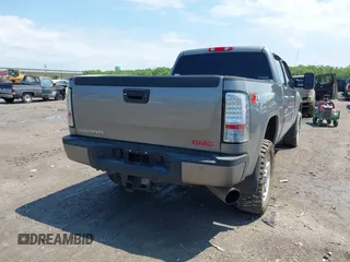 2013 GMC Sierra 2500HD Denali with VIN 1GT125E80DF154320, listed as a IAAI auction lot 42264742 with 171,013 mi miles and . Bid and sale history available at DreamBid. Image 4.