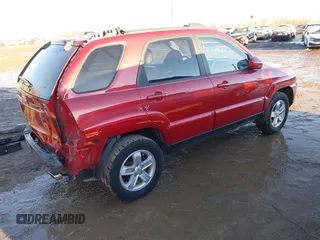 2009 Kia Sportage LX with VIN KNDJE723997634014, listed as a IAAI auction lot 41452224 with 148,643 mi miles. Bid and sale history available at carsss.com. Image 4.