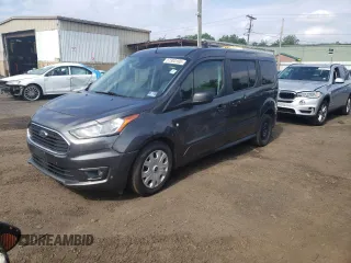2019 Ford Transit Connect XLT z VIN NM0GE9F23K1390051, wystawiony jako Copart lot #57303165 z przebiegiem 90 595 mil mil oraz Czysty tytuł • Clean title. Historia ofert i sprzedaży dostępna na DreamBid. Obrazek 1.