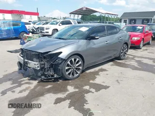 2016 Nissan Maxima SL with VIN 1N4AA6AP7GC395308, listed as a IAAI auction lot 42187762 with 154,171 mi miles and . Bid and sale history available at DreamBid. Image 2.