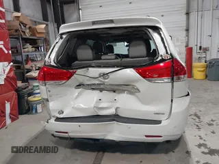 2011 Toyota Sienna XLE AAS with VIN 5TDYK3DC9BS091563, listed as a IAAI auction lot 41393689 with 229,663 mi miles and . Bid and sale history available at DreamBid. Image 6.