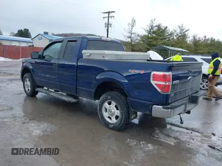 2009 Ford F-150 STX with VIN 1FTRX14809KC93165, listed as a IAAI auction lot 41563841 with 156,690 mi miles. Bid and sale history available at carsss.com. Image 3.