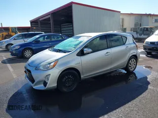 2015 Toyota Prius One z VIN JTDKDTB36F1578113, wystawiony jako IAAI lot #41302191 z przebiegiem 124 610 mil mil oraz . Historia ofert i sprzedaży dostępna na DreamBid. Obrazek 2.