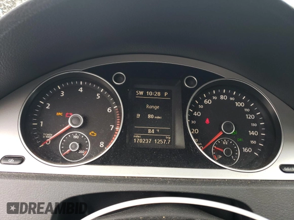 2009 Volkswagen Passat Komfort z VIN WVWJK73CX9P055380, wystawiony jako Copart lot #65812774 z przebiegiem 170 237 mil mil oraz Czysty tytuł • Clean title. Historia ofert i sprzedaży dostępna na DreamBid. Obrazek 9.