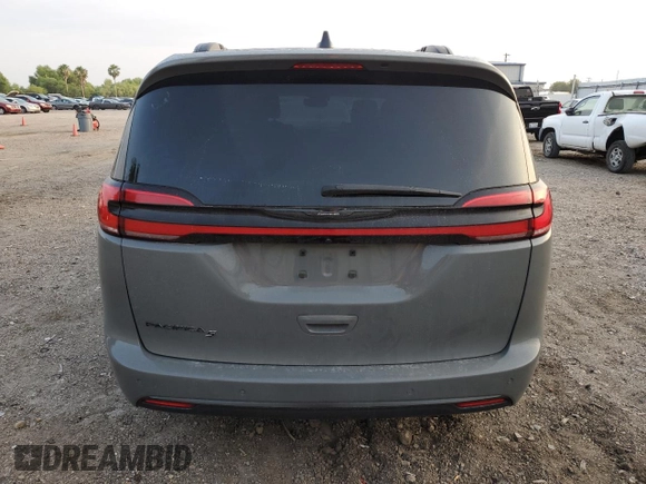 2023 Chrysler Pacifica Touring L with VIN 2C4RC1BG4PR505313, listed as a Copart auction lot 54069305 with 24,687 mi miles and Salvage title. Bid and sale history available at DreamBid. Image 6.