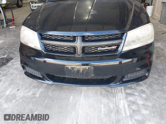 2014 Dodge Avenger SE with VIN 1C3CDZAB0EN202602, listed as a IAAI auction lot 42133657 with 130,741 mi miles. Bid and sale history available at carsss.com. Image 6.