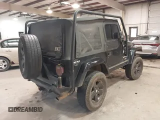 1999 Jeep Wrangler Sahara z VIN 1J4FY49S4XP432567, wystawiony jako IAAI lot #41562455 z przebiegiem Nie podano mil oraz . Historia ofert i sprzedaży dostępna na DreamBid. Obrazek 4.