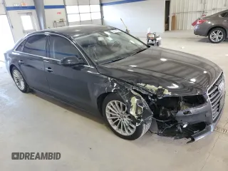 2016 Audi A8 Sport z VIN WAU43AFD1GN011589, wystawiony jako Copart lot #86614934 z przebiegiem 96 137 mil mil oraz Szkoda całkowita • Salvage title. Historia ofert i sprzedaży dostępna na DreamBid. Obrazek 4.
