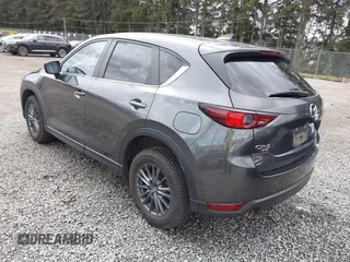 2021 Mazda CX-5 Touring with VIN JM3KFBCM2M0484011, listed as a IAAI auction lot 41825954 with 48,958 mi miles. Bid and sale history available at carsss.com. Image 3.