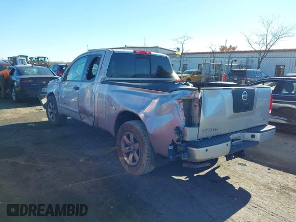 2012 Nissan Titan SE with VIN 1N6AA0CA6CN312785, listed as a IAAI auction lot 40810558 with 122,078 mi miles. Bid and sale history available at carsss.com. Image 3.