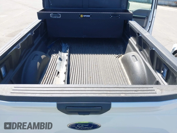2018 Ford F-150 XL with VIN 1FTMF1CB1JKC01852, listed as a IAAI auction lot 42449112 with 99,105 mi miles and . Bid and sale history available at DreamBid. Image 8.