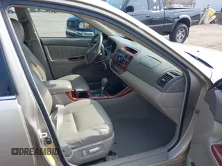 2004 Toyota Camry LE with VIN 4T1BF30K94U587836, listed as a IAAI auction lot 41714277 with 211,893 mi miles and . Bid and sale history available at carsss.com. Image 5.