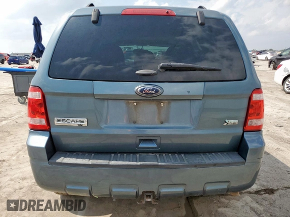 2012 Ford Escape XLT z VIN 1FMCU0DG3CKC07799, wystawiony jako Copart lot #59535605 z przebiegiem 69 378 mil mil oraz Szkoda całkowita • Salvage title. Historia ofert i sprzedaży dostępna na DreamBid. Obrazek 6.
