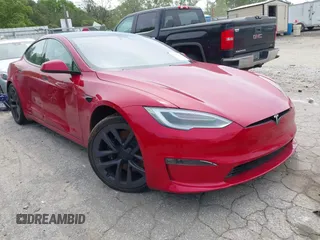 2022 Tesla Model S with VIN 5YJSA1E58NF470737, listed as a IAAI auction lot 42035040 with 15,224 mi miles and . Bid and sale history available at DreamBid. Image 1.