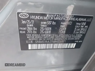 2021 Hyundai Santa Fe SE with VIN 5NMS14AJ7MH326971, listed as a IAAI auction lot 41149061 with 52,602 mi miles. Bid and sale history available at carsss.com. Image 9.