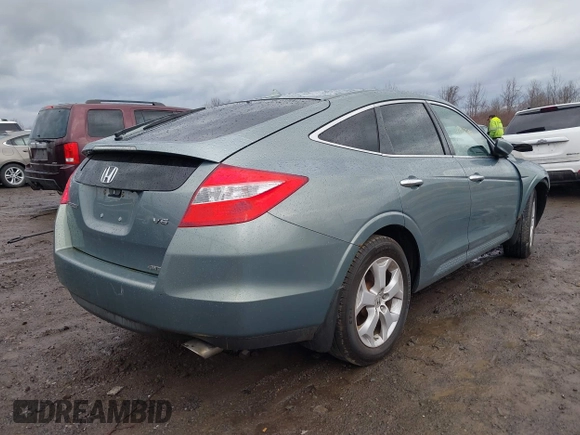 2012 Honda Crosstour EX-L z VIN 5J6TF2H56CL003893, wystawiony jako IAAI lot #41917798 z przebiegiem 205 050 mil mil oraz . Historia ofert i sprzedaży dostępna na DreamBid. Obrazek 4.
