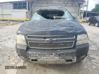 2011 Chevrolet Suburban LT with VIN 1GNSKJE38BR240348, listed as a Copart auction lot 54163335 with 263,030 mi miles and Salvage Title. Bid and sale history available at carsss.com. Image 5.