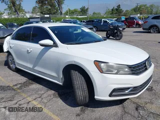 2017 Volkswagen Passat S with VIN 1VWAT7A30HC062762, listed as a IAAI auction lot 42270954 with 129,734 mi miles and . Bid and sale history available at DreamBid. Image 1.