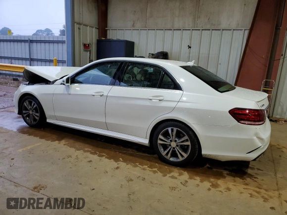 2014 Mercedes-Benz E 400 Sport with VIN WDDHF9FBXEA936424, listed as a Copart auction lot 83331224 with 194,689 mi miles and Salvage Title. Bid and sale history available at DreamBid. Image 2.