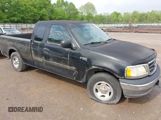 2003 Ford F-150 XL with VIN 1FTRX17263NA23449, listed as a IAAI auction lot 42111505 with 1 mi miles. Bid and sale history available at carsss.com. Image 1.